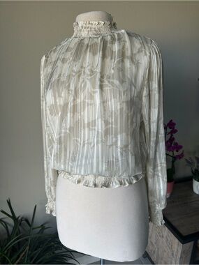 Trendy J's Floral & Metallic Stripe
Smocked Blouse